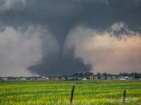 A tornado near Didsbury and Carstairs photographed by storm chaser Matt Melnyk on Saturday, July 1, 2023.