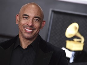 FILE - Harvey Mason jr., CEO of The Recording Academy, appears at the 63rd annual Grammy Awards in Los Angeles on March 14, 2021.