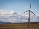 TransAlta Corp. says it has signed an agreement to acquire the minority stake in TransAlta Renewables Inc. that it does not already own. A TransAlta wind farm is shown near Pincher Creek, Alta.