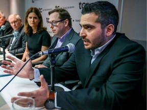 Andrew Mulé of Métro Média makes a statement with union leaders and publishers in defence of the Publisac in Montreal Dec. 9, 2019.