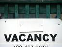 An For Rent sign is shown in front of a downtown Calgary apartment building on Aug. 11.