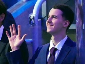 Toronto Maple Leafs' 2020 first round draft pick Rodion Amirov waves as he is acknowledged by the crowd during a pre-game ceremony prior to NHL hockey action against the Washington Capitals in Toronto on October 13, 2022.