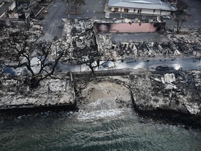 Destroyed homes and buildings on the waterfront burned to the ground in Lahaina