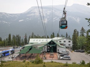 Hundreds of people were stranded after a power outage shut down the Banff Gondola and some had to be airlifted by helicopter, in Banff, Alta., on Tuesday, Aug. 8, 2023. A photographer who was taking wedding pictures at the top of Sulphur Mountain earlier this week says there didn't appear to be any contingency plan when the gondola broke down. CANADIAN PRESS/Jeff McIntosh