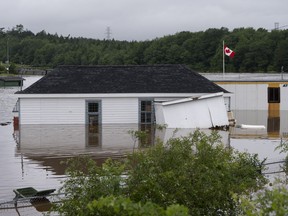 Buildings are seen in floodwater following a major rain event in Halifax on Saturday, July 22, 2023.