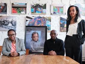 A coroner's inquest into the death of a disabled teen who was in the care of an Ontario school for blind children is set to begin today.. Samuel Brown's mother Andrea Brown, left to right, father Gladstone Brown and family lawyer Saron Gebresellasi are shown with a portrait of Samuel Brown in a handout photo.