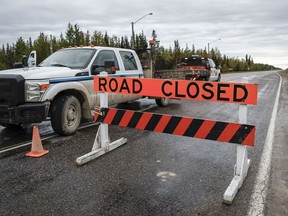 A state of emergency in the Northwest Territories has been extended until Sept. 11. The road is closed north to Yellowknife from Fort Providence, N.W.T., Thursday, Aug. 17, 2023.