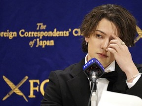 FILE -Kauan Okamoto, a musician and former member of Japanese pop group Johnny's Jr., who says he was sexually assaulted by talent agent Johnny Kitagawa, speaks at a press conference at the Foreign Correspondents' Club of Japan in Tokyo, on April 12, 2023. Kazuya Nakamura, a former Johnny's Jr singer and dancer who said he was also abused by the now deceased Kitagawa, said in an interview that hearing Okamoto's story made him regret not coming forward sooner.