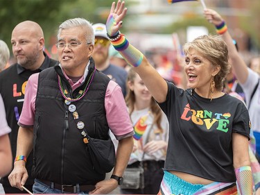 Councillor Terry Wong, left, and Mayor Jyoti Gondek along with thousands of Calgarians celebrate Pride Week with the Calgary Pride Parade in downtown Calgary on Sunday, September 3, 2023.