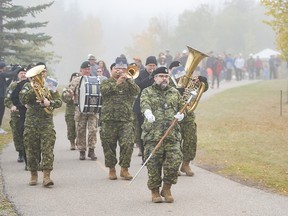 The King’s own Calgary regiment band leads the sixth annual Canadian Walk for Veterans in South Glenmore Park in Calgary on Saturday, September 23, 2023.