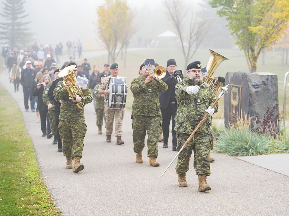 The King’s own Calgary regiment band leads the sixth annual Canadian Walk for Veterans in South Glenmore Park in Calgary on Saturday, September 23, 2023.