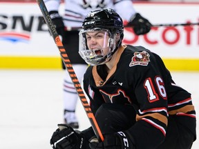 Calgary Hitmen forward Carson Wetsch celebrates a goal against the Red Deer Rebels at the Scotiabank Saddledome on April 3, 2023.
