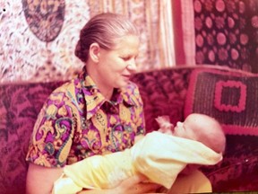 Ursula Leonowicz's paternal grandmother holding her as a newborn.