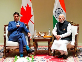 Prime Minister Justin Trudeau, left, takes part in a bilateral meeting with Indian Prime Minister Narendra Modi during the G20 Summit in New Delhi, on Sept. 10.