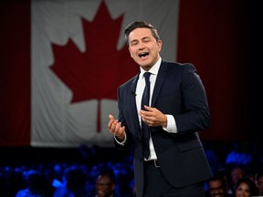 Conservative Leader Pierre Poilievre speaks to delegates at the Conservative Party Convention, Friday, September 8, 2023 in Quebec City. THE CANADIAN PRESS/Jacques Boissinot