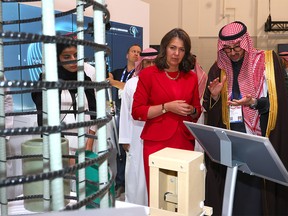 Premier Danielle Smith gets a tour of the Saudi Arabia display during the 24th World Petroleum Congress in Calgary on Sunday, September 17, 2023.