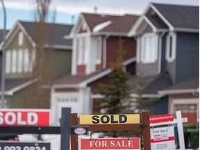 Houses are put up for sale in Calgary