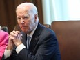 U.S. President Joe Biden listens to shouted questions regarding impeachment during a meeting of his Cancer Cabinet at the White House on September 13, 2023 in Washington, DC