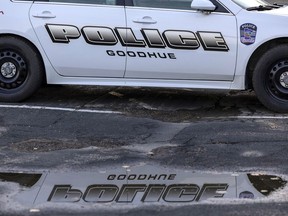 A Goodhue police car is parked outside City Hall on Monday, Aug. 14, 2023, in Goodhue, Minn. The small town will soon be without a police department, an exodus spurred by low pay for the chief and his officers.