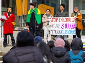 "Stop exploiting us," say International students at Vancouver's Emily Carr University of Art + Design in 2022, protesting higher tuition fees and extreme cost of living.
