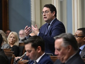 Quebec Education Minister Bernard Drainville responds to the Opposition during question period Wednesday, Sept. 13, 2023, at the legislature in Quebec City.