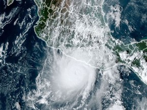 This handout picture taken on October 24, 2023 shows hurricane Otis approaching Mexico's southern Pacific coast.