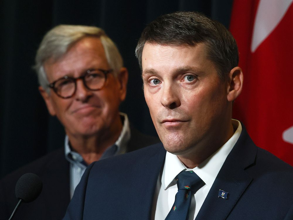 Alberta Finance Minister Nate Horner, right, and Jim Dinning, chair of the Alberta Pension Plan Report Engagement Panel, release a report on a potential Alberta Pension Plan on September 20, 2023.