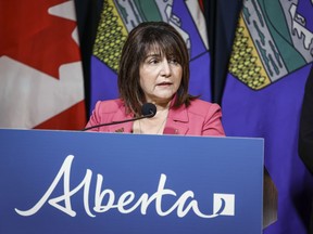 Alberta Minister of Health Adriana LaGrange speaks to the media in Calgary, Tuesday, Sept. 12, 2023. Alberta Health Services is adopting stricter masking rules in hospitals as it deals with COVID-19 outbreaks. However, regions and individual hospitals are free to ignore the directive.