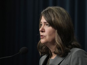Alberta Premier Danielle Smith speaks during a news conference in Calgary on Friday, Oct. 13, 2023. Members of Alberta's governing United Conservative Party are to debate a resolution surrounding gender pronouns in schools and parental consent.