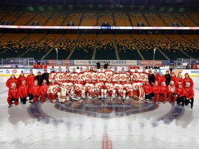 The Calgary Flames pose for a team photo before practice at Commonwealth Stadium on October 28, 2023 in Edmonton, Alberta.