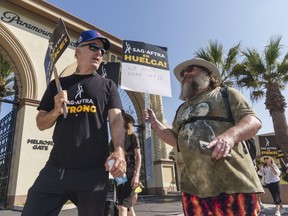 Actors Bob Odenkirk, left, and Jack Black join demonstrators outside the Paramount Pictures Studio in Los Angeles, Tuesday, Sept. 26, 2023.