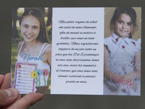 A card distributed by the family depicts Romy, right, and Norah Carpentier, at a funeral home in Levis, Que., on July 20, 2020.