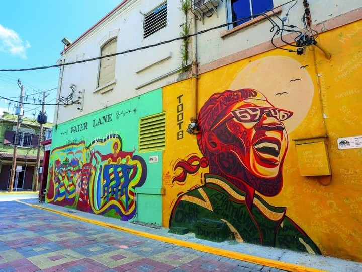  Art murals are seen on a food walking tour in downtown Kingston. Courtesy, Jamaican Tourist Board