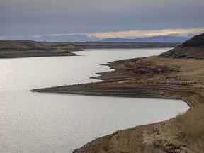 The receding waters of Pine Coulee Reservoir reveal former high-water marks west of Parkland, Ab., on Tuesday, November 7, 2023.