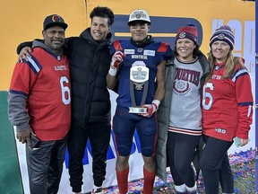 From left: Father Cory Philpot, Jalen Philpot of the Stampeders, Tyson Philpot of the Alouettes, sister Kaitlyn Purcell and mother Colleen Purcell celebrate at the Grey Cup.