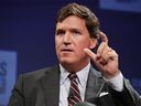 Former Fox News host Tucker Carlson will have a conversation with Premier Danielle Smith in Calgary on Jan. 24.