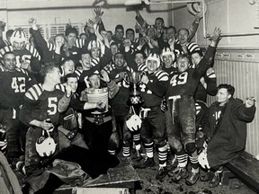 The Calgary Stampeders celebrate in the locker-room after defeating the Ottawa Rough Riders in the Grey Cup at Varsity Stadium in Toronto on Nov. 27, 1948. Photo courtesy of Calgary Stampeders historian Daryl Slade