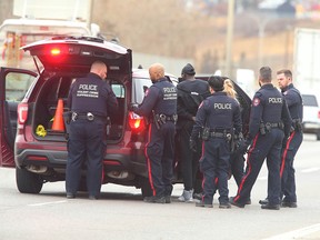 Calgary police take a man into custody on Wednesday, November 15, 2023 in relation to a fatal shooting