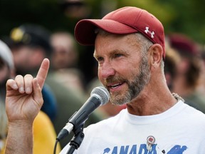James Topp speaks to the crowd during a protest against COVID-19 health measures at the National War Memorial in Ottawa, June 30, 2022. The former Armed Forces soldier has more than 30 years of service with deployments to Croatia, Afghanistan and other war zones.