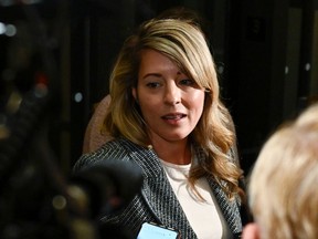 Foreign Affairs Minister Mélanie Joly speaks to reporters on Oct. 3, 2023.