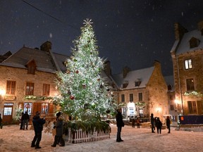 A Christmas tree and Christmas decorations are seen in the historic Place Royale part of Quebec City.
