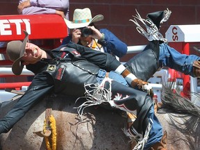 Clint Laye, of Cadogan, Alta., rode Soap Bubbles to a score of 86 during Day 2 of the bareback event at the Calgary Stampede rodeo on Saturday.