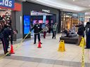 Police contain a scene inside Market Mall after a stabbing on Friday, November 24, 2023.