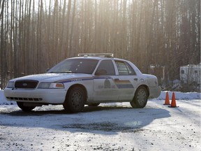 An RCMP vehicle at the scene of a 2015 homicide near Edson. The Albert government's plan to regionalize victim services, largely in RCMP jurisdictions, is encountering pushback, including from one board member who claims his board lost funding after he spoke out.