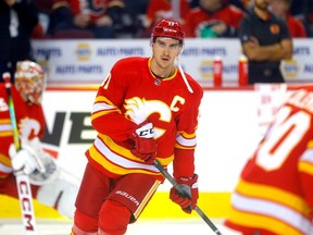 Mikael Backlund is “trying a find a balance — to play better myself and to also figure out how the team can be better.”