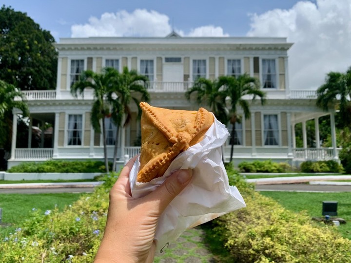  A Jamaican patty is enjoyed at Devon House in Kingston. Courtesy, Jamaican Tourist Board