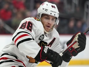 Chicago Blackhawks right wing Patrick Kane plays against the Detroit Red Wings in the third period of an NHL hockey game, Jan. 26, 2022, in Detroit. Kane is signing with the Red Wings, a person with knowledge of the decision tells The Associated Press. Kane is expected to sign a contract for the remainder of the NHL season. The 35-year-old is coming off hip resurfacing surgery done to try to move past a nagging injury.