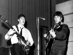 Paul McCartney and John Lennon in an undated photo.