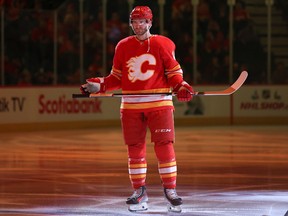 Jonathan Huberdeau #10 of the Calgary Flames looks on before the game against the Florida Panthers