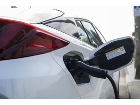 A ChargePoint electric vehicle charging station in North Vancouver, British Columbia, Canada, on Tuesday, Sept. 13, 2022. The use of road fuel for passenger cars is set to continuously decline after 2023 as the world switches to lower-carbon drivetrains.